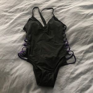 Black and purple strappy one piece suit